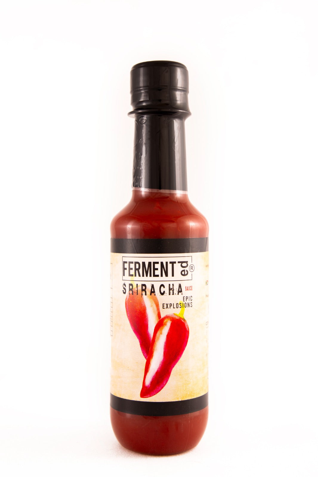Fermented Sriracha Sauce Epic Explosions 250ml
FERMENTed Sriracha Sauce: Fermented Fire in a Bottle
Sriracha Sauce starts with the iconic red jalapenos, carefully fermented to intensify their spiciness. Infused with garlic, sugar, and the perfect balance of tangy vinegar, this sauce achieves a unique harmony of flavours that transcends the ordinary.
Versatile and addictive, FERMENTed Sriracha Sauce is your go-to condiment for adding a kick to noodles, stir-fries, burgers, and more. The ferme