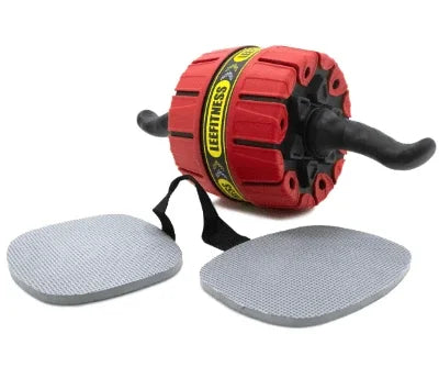 Red ab roller with knee pads for home fitness workouts