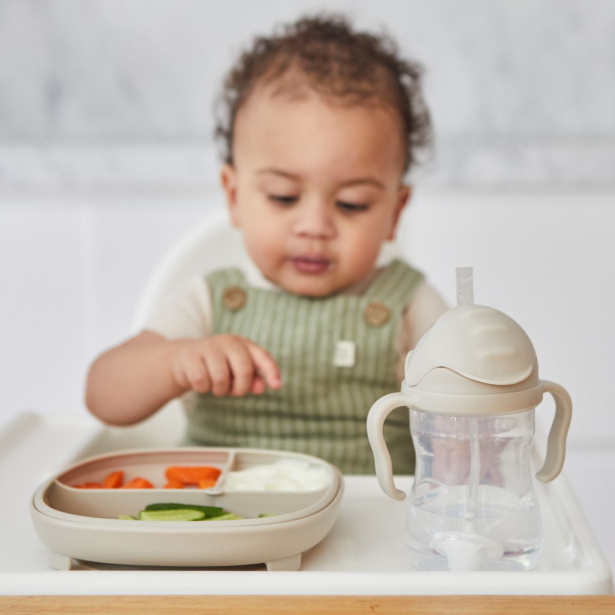 B.Box 240ml sippy cup with weighted straw and easy-grip handles, shown in a modern matte finish.