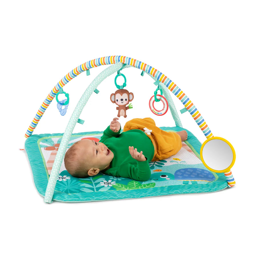 Bright Starts Baby Activity Gym & Play Mat

Throw your baby a party of activity with the Palm Party Activity Gym from Bright Starts. Your king or queen of the jungle will love to kick, lay and play on this tummy time mat! The gender neutral play gym with toy bar includes 4 detachable hanging toys, like the plush monkey toy with jingle chimes, baby-safe mirror, ring rattle with colorful beads, and soothing texture toy.