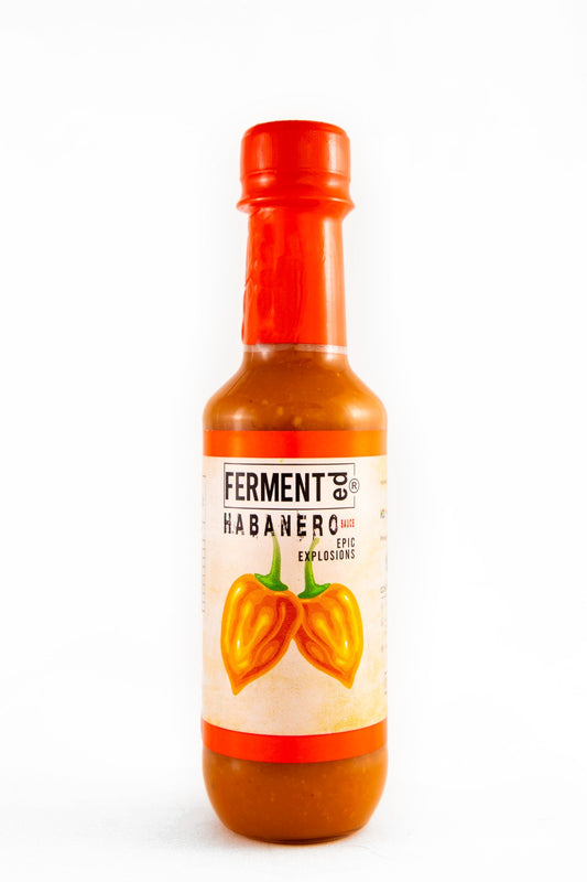 Fermented Habanero Sauce Epic Explosions 250ml

FERMENTed Habanero Sauce: Intense Heat, Fermented Elegance
Selected for their vibrant orange hue and distinctive spiciness, habanero peppers undergo a transformative fermentation process that elevates their natural heat to new heights. The result is a sauce that not only packs a punch but also boasts a depth of flavour that sets it apart.