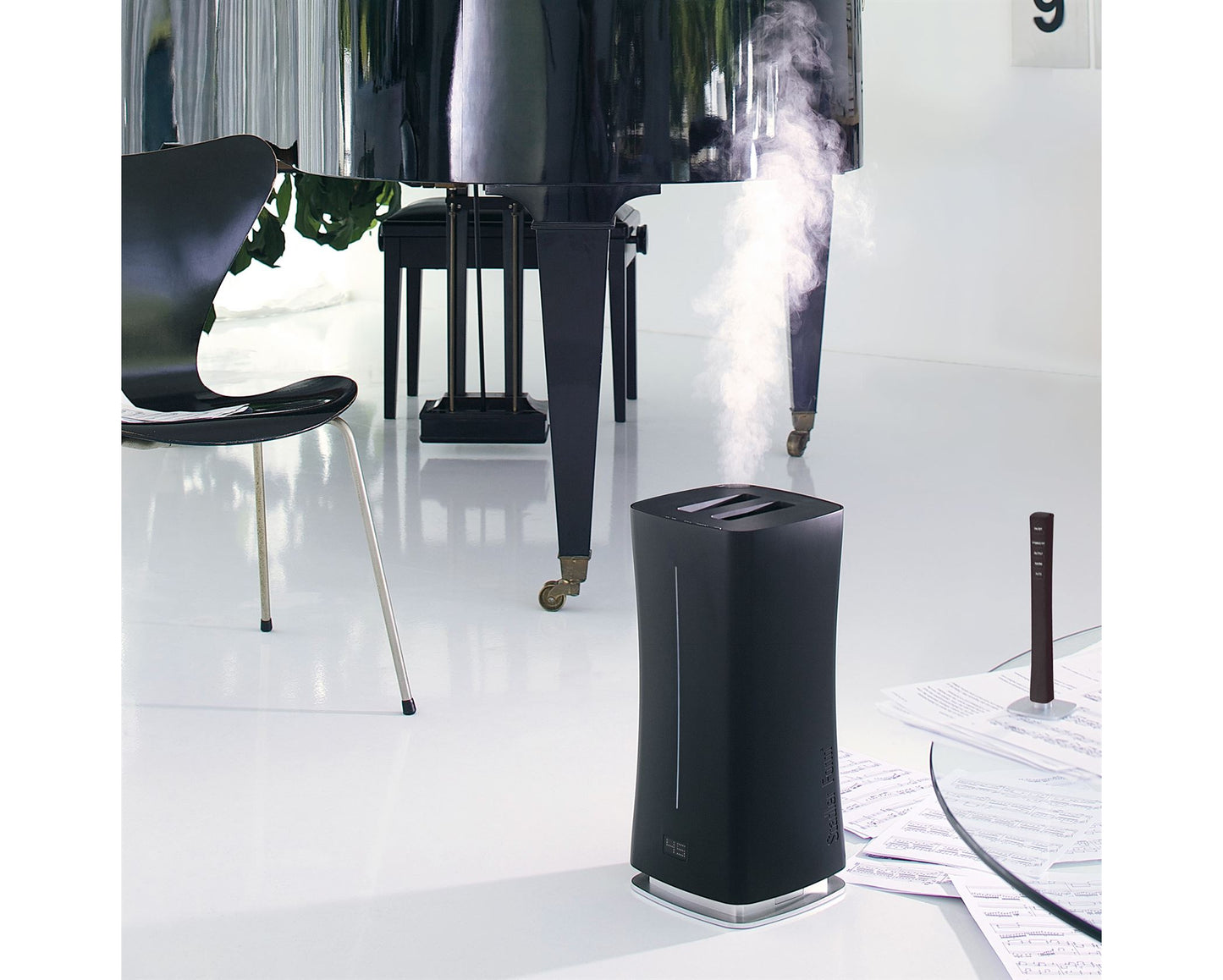Stadler Form Humidifier With Fragrance Dispenser Wifi Connectivity Black 6.3L 10-95W "Eva" #

The precise humidifier-lady Eva ensures exact humidification thanks to the unique external humidity sensor Remote Sensor™ which also serves as remote control. Using the hygrostat, the humidity level can individually be selected between 30 – 75 % or continuous operation.