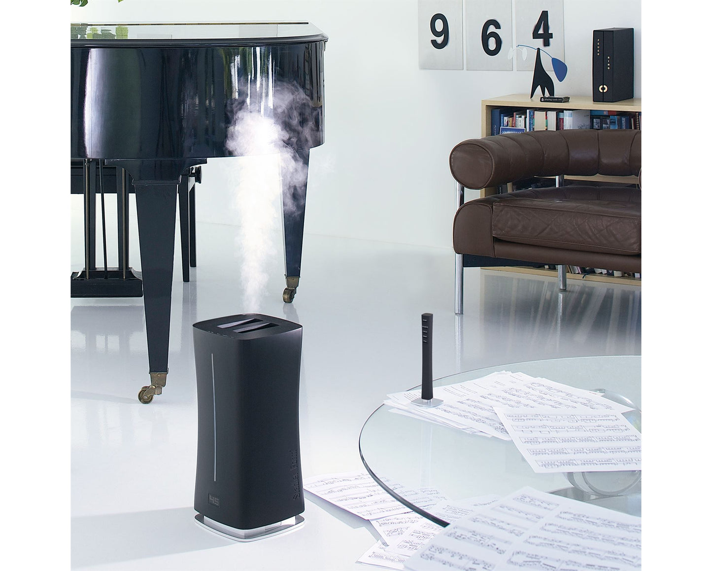 Stadler Form Humidifier With Fragrance Dispenser Wifi Connectivity Black 6.3L 10-95W "Eva" #

The precise humidifier-lady Eva ensures exact humidification thanks to the unique external humidity sensor Remote Sensor™ which also serves as remote control. Using the hygrostat, the humidity level can individually be selected between 30 – 75 % or continuous operation.