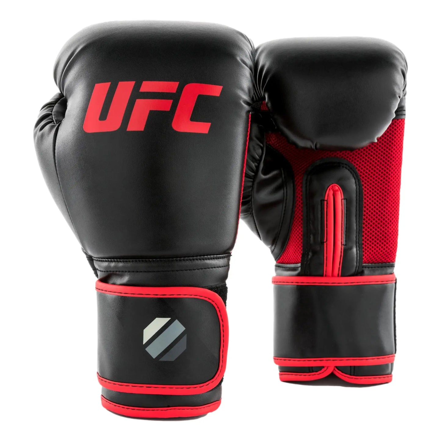 UFC Muay Thai Style Training Gloves
DON’T JUST FUNCTION, PERFORM

Enhance your endurance, strength and sparring skills with this high-energy impact dispersing Thai-style training glove. The internal hand compartment offers a secure, snug fit without sacrificing comfort. Layers of high-density moulded foam keep hands protected during heavy sparring and bag workout sessions. Rigid wrap-around hook &amp; loop closure supports wrist.