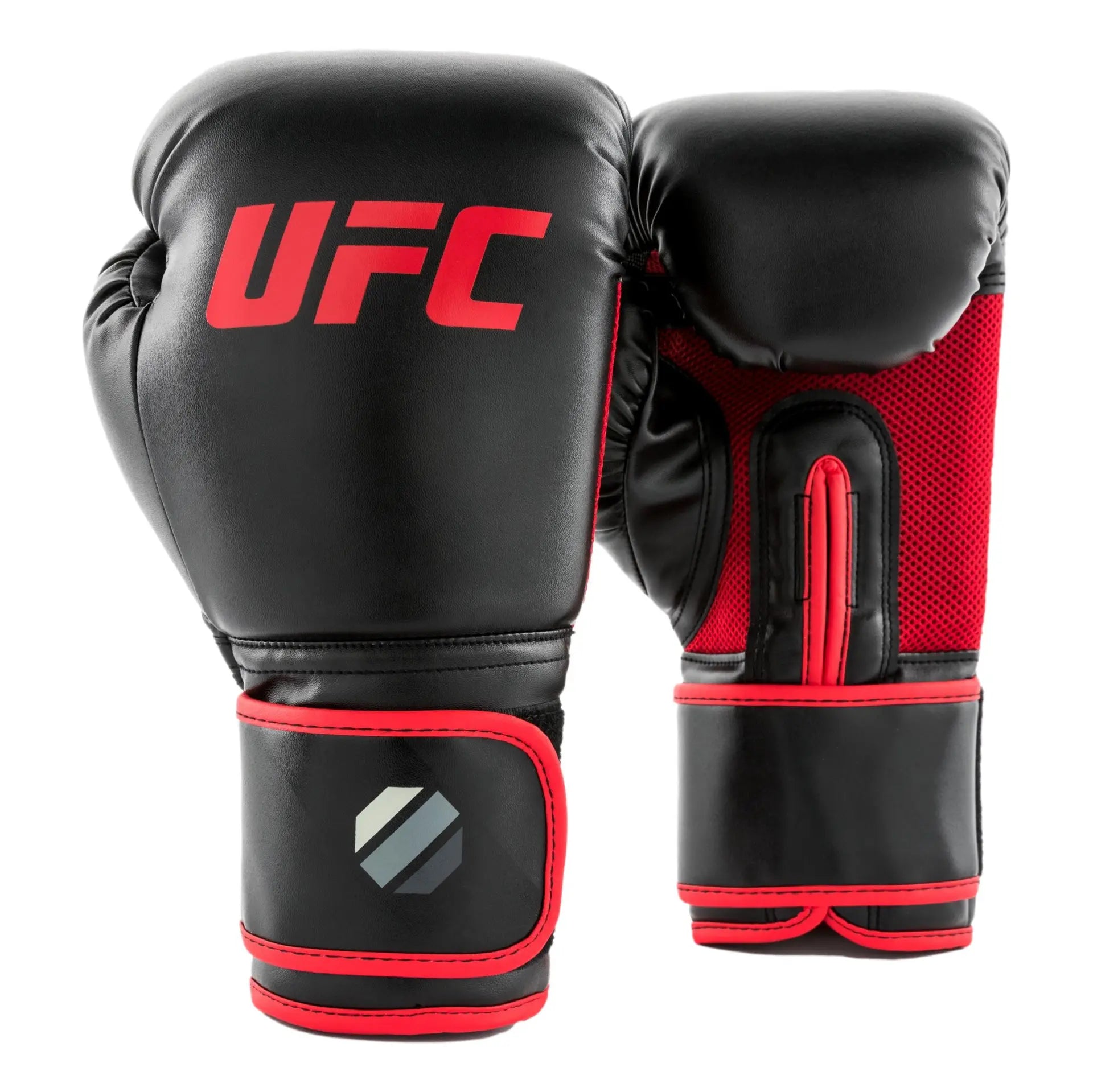 UFC Muay Thai Style Training Gloves
DON’T JUST FUNCTION, PERFORM

Enhance your endurance, strength and sparring skills with this high-energy impact dispersing Thai-style training glove. The internal hand compartment offers a secure, snug fit without sacrificing comfort. Layers of high-density moulded foam keep hands protected during heavy sparring and bag workout sessions. Rigid wrap-around hook &amp; loop closure supports wrist.