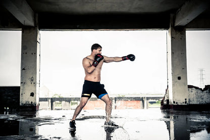 UFC Muay Thai Style Training Gloves
DON’T JUST FUNCTION, PERFORM

Enhance your endurance, strength and sparring skills with this high-energy impact dispersing Thai-style training glove. The internal hand compartment offers a secure, snug fit without sacrificing comfort. Layers of high-density moulded foam keep hands protected during heavy sparring and bag workout sessions. Rigid wrap-around hook &amp; loop closure supports wrist.