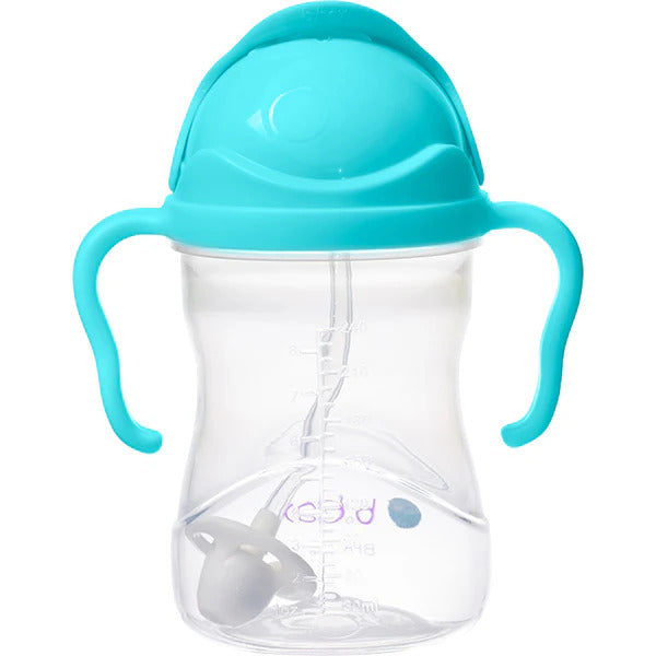 B.Box weighted straw sippy cup held in hand showing compact toddler size