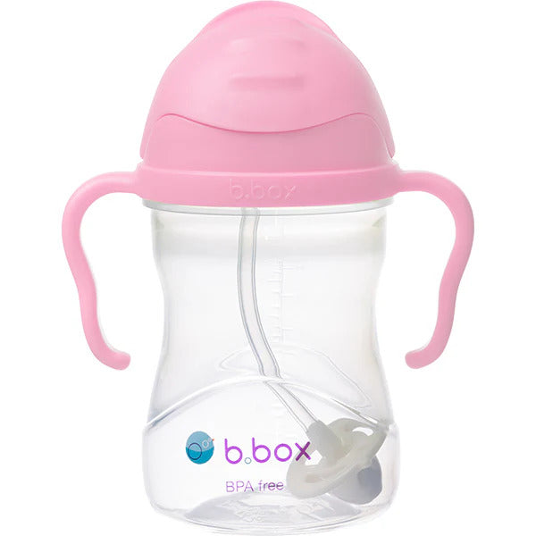 B.Box sippy cup shown tilted proving 360 degree weighted straw functionality