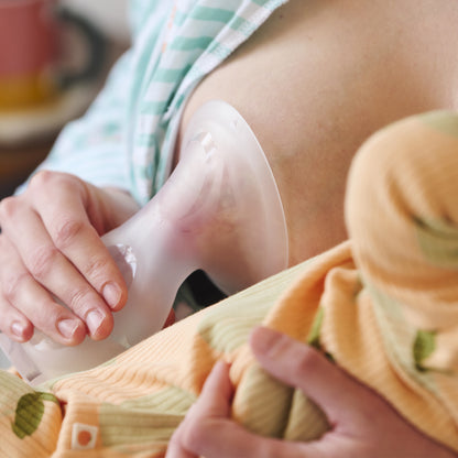 Using a Tommee Tippee silicone pump as a let-down catcher while nursing