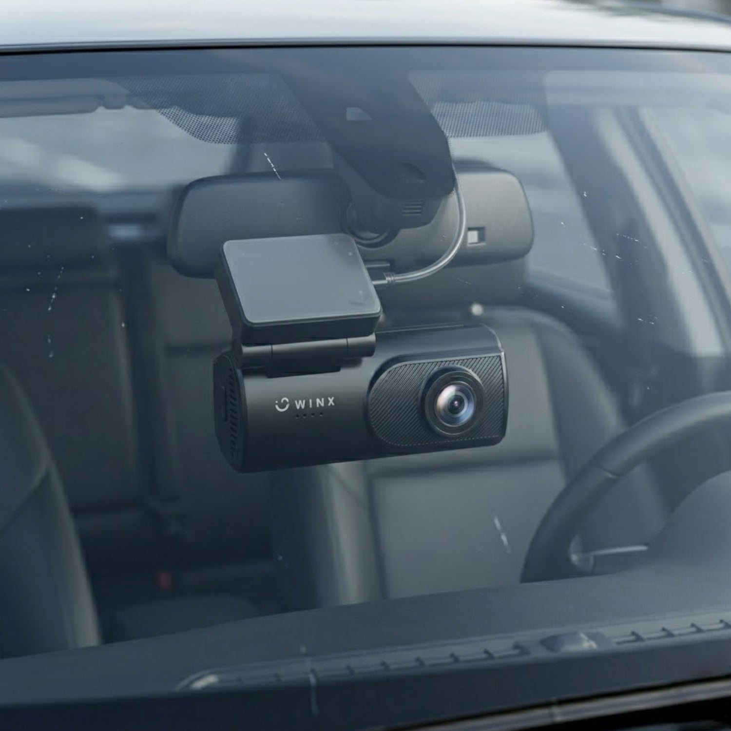 Close-up shot of the F1.8 dash cam lens highlighting its night vision capability