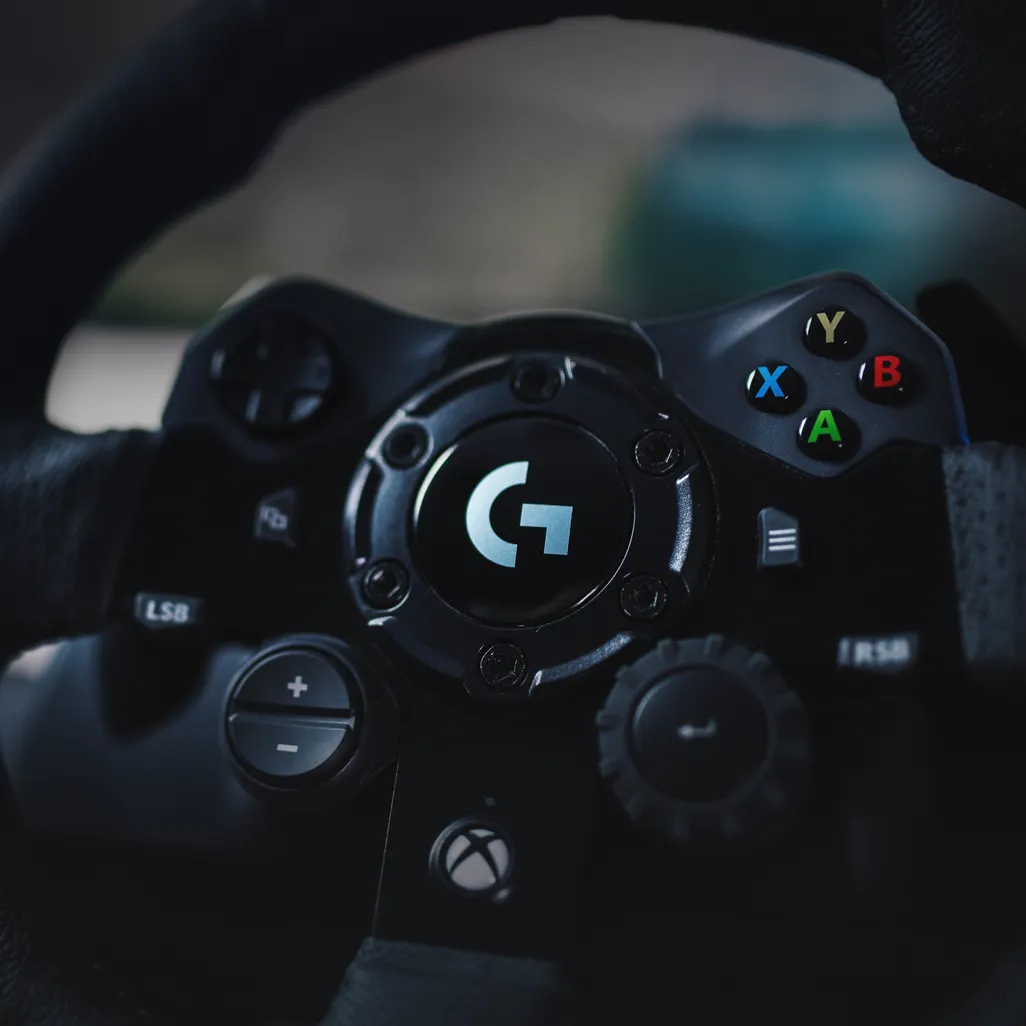 Close-up of the hand-stitched leather steering wheel on the Logitech G G923