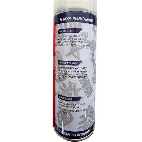 Spraying Imoto Shaya Igundwani rat repellent onto car engine wiring and rubber hoses