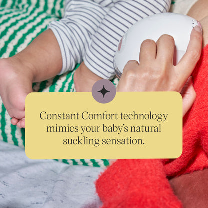 Discreet hands-free Tommee Tippee breast pump worn inside a nursing bra