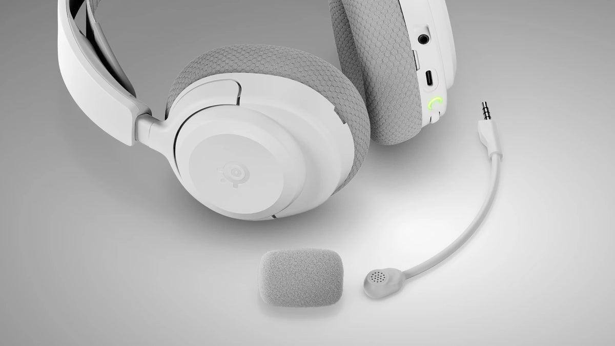 Detail view of volume chatmix dial mute button and power quick-switch button on Nova 3X