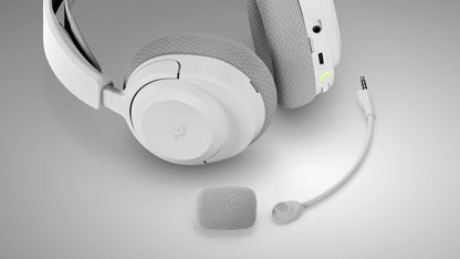Detail view of volume chatmix dial mute button and power quick-switch button on Nova 3X