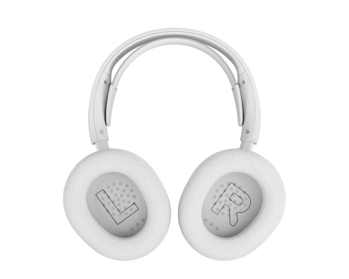 Detail view of volume dial mute switch and quick-switch wireless controls on Nova 5 white