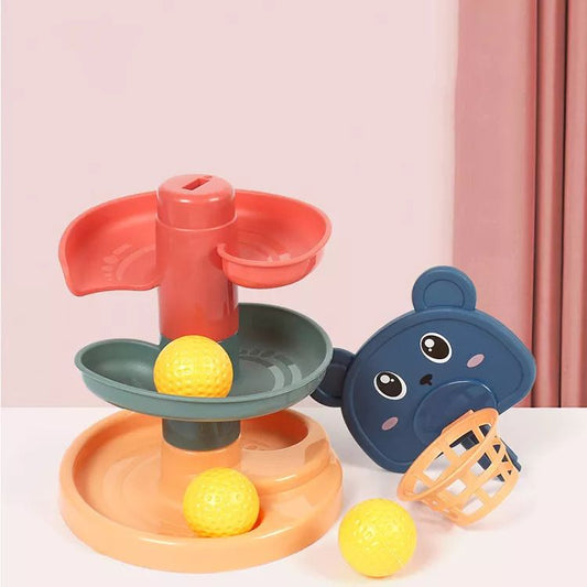 Toddler reaching to drop a ball into the Kids-Up 9-level activity tower