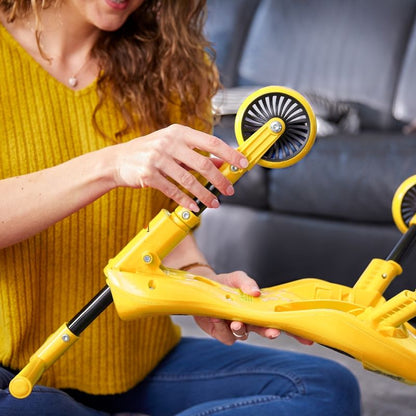Toddler using a Scuttlebug Bumblebee bike for motor skill development