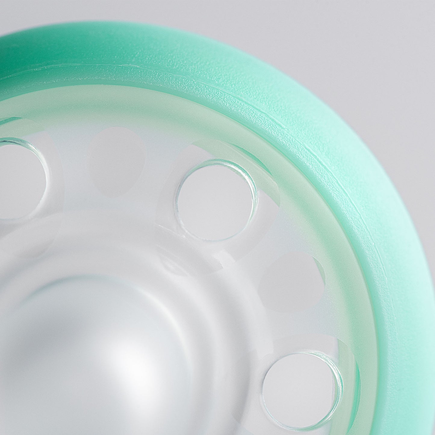 Arched airflow shield and facial ventilation on Tommee Tippee night pacifier