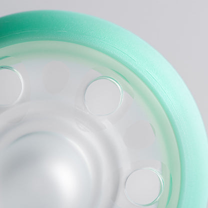 Arched airflow shield and facial ventilation on Tommee Tippee night pacifier