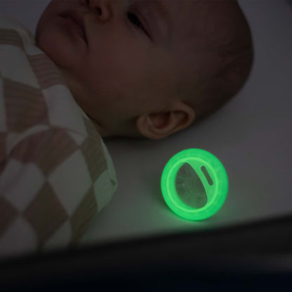 Side profile showing skin-contouring arched shield on Tommee Tippee night soother