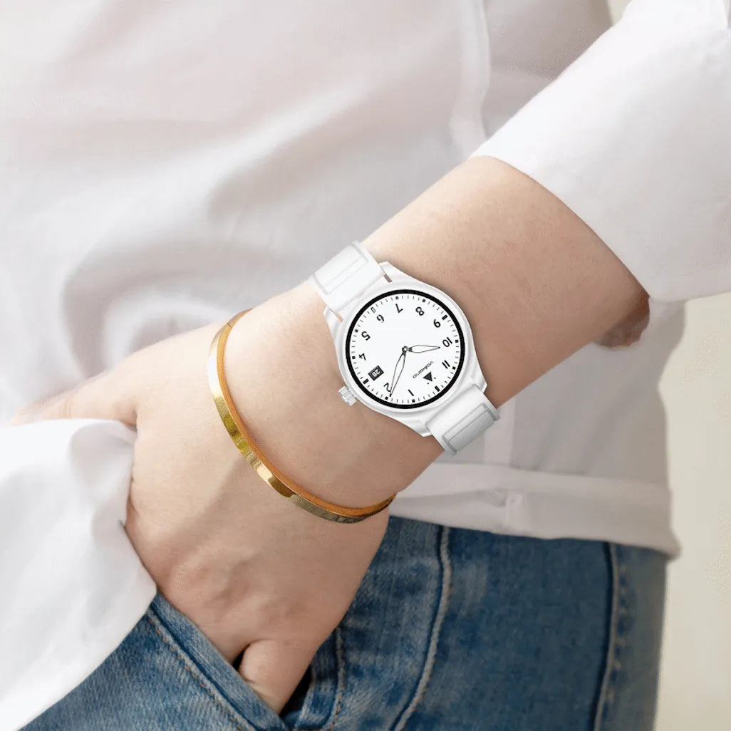 User wearing white Volkano Eon AMOLED smartwatch on wrist during active daily routine