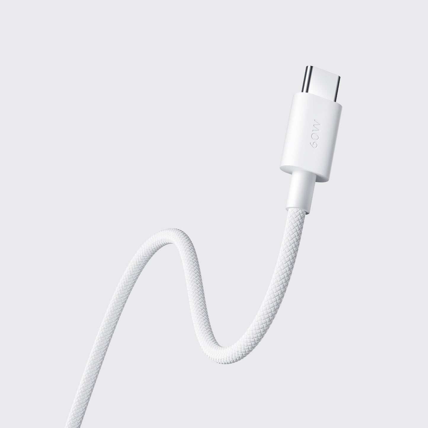 Macro detail view showing white textile braided texture of Xiaomi USB-C fast charge cable