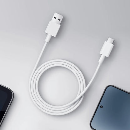 Close-up of USB-A male connector and USB Type-C male connector on Xiaomi white cable
