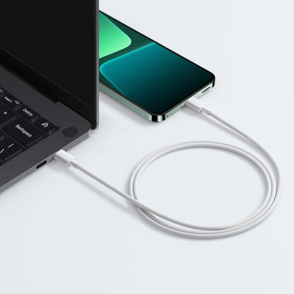 Close-up of white braided USB Type-C connector head on Xiaomi 60W charging cable